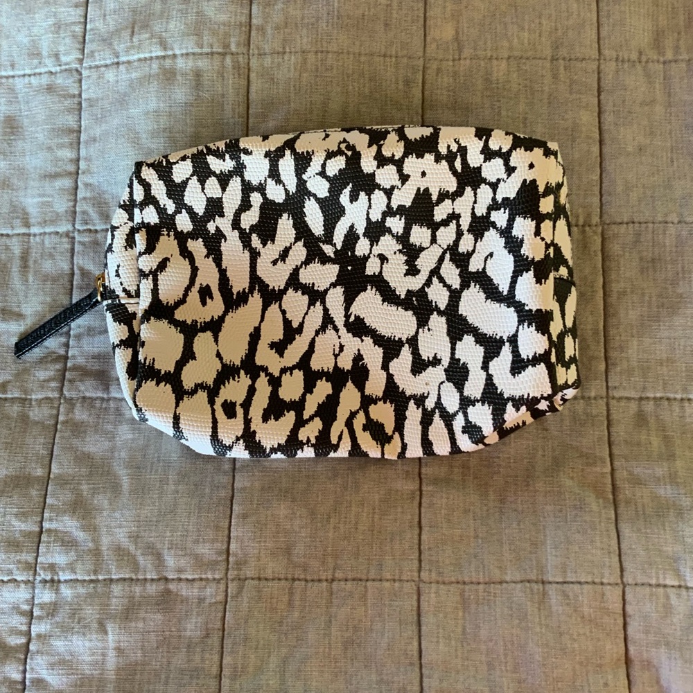 Estee Lauder Black and White Patterned faux leather cosmetic bag or Pouch